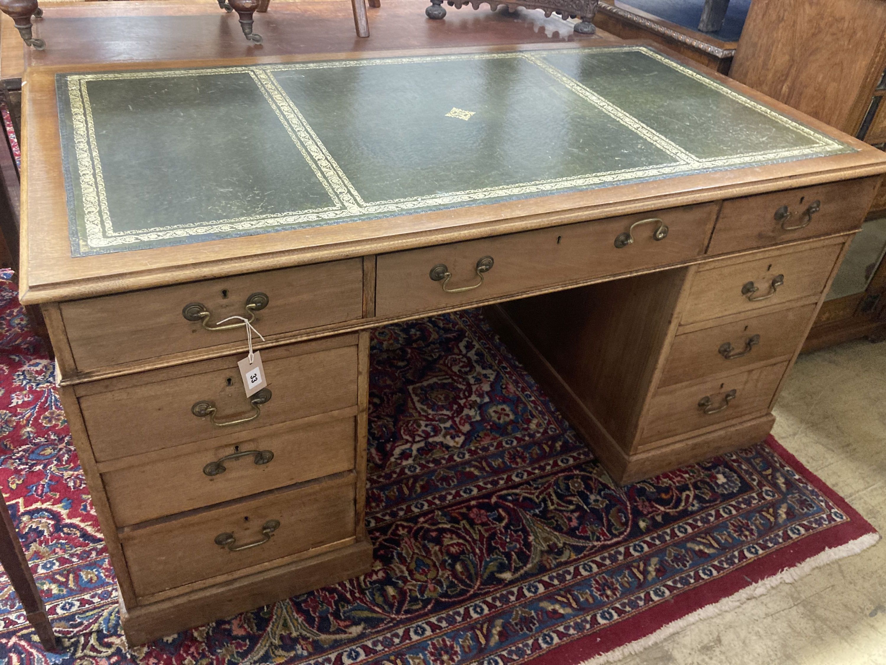 An early 20th century George III style mahogany pedestal desk, width 150cm, depth 81cm, height 76cm